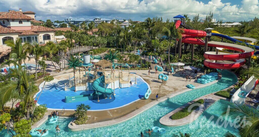 Resort waterpark with waterslides, a lazy river, and a kids splash area at a Beaches resort